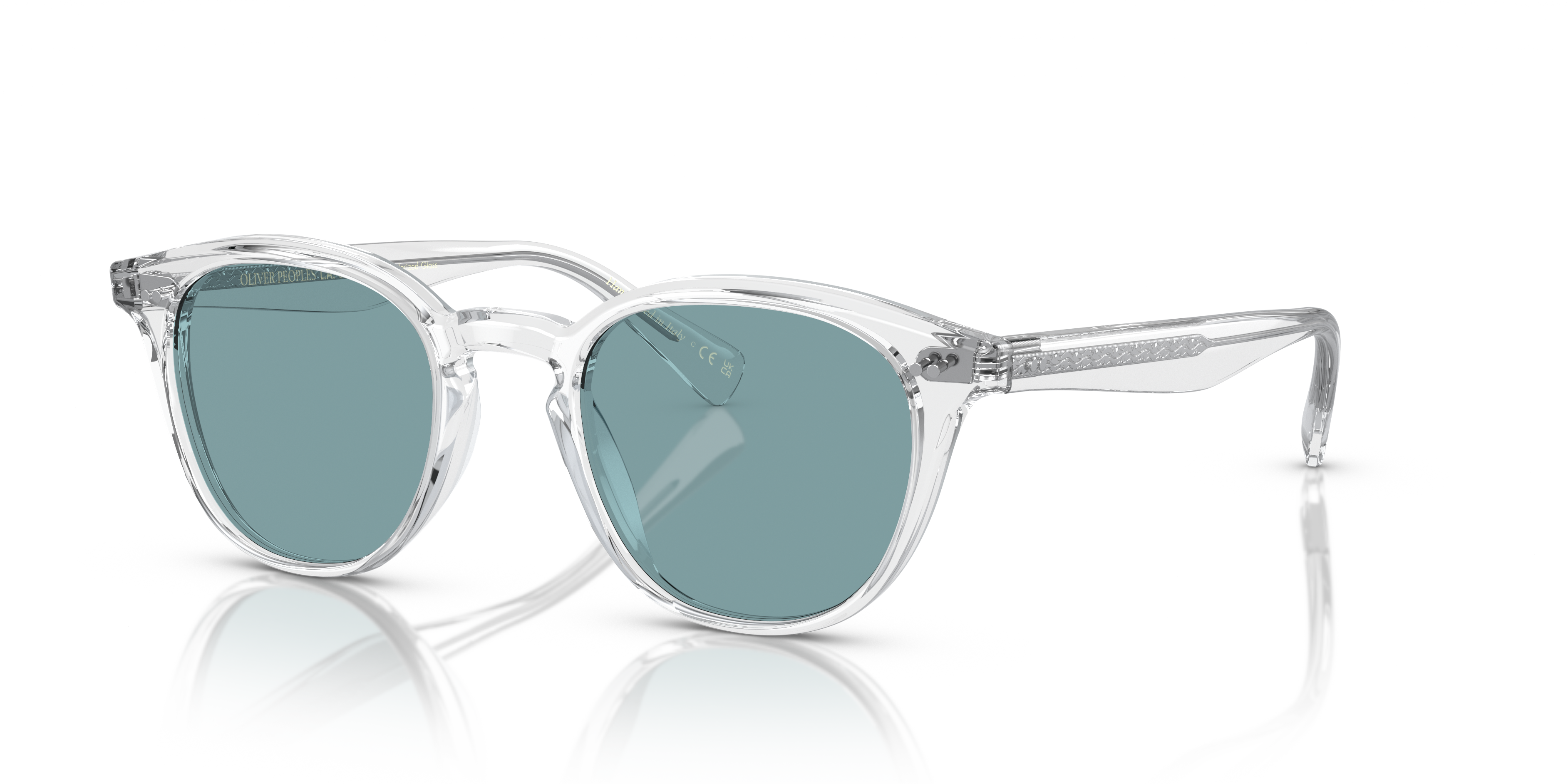 Oliver Peoples Desmon Sun の クリスタル フレームと ティールポラ