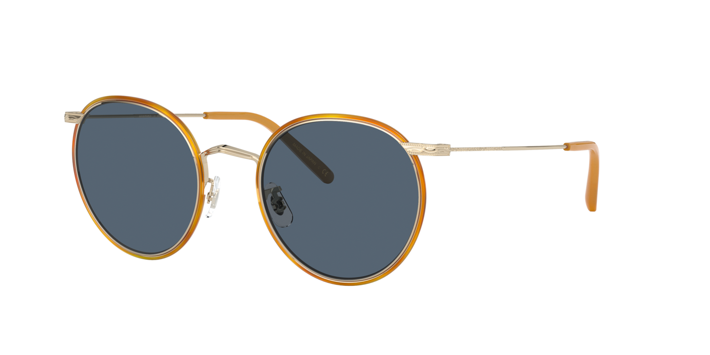 Sie Oliver Peoples Casson mit Weichgold-Bernstein Gestell und Blau Gläsern - Bild Abschlusselement des Bügels