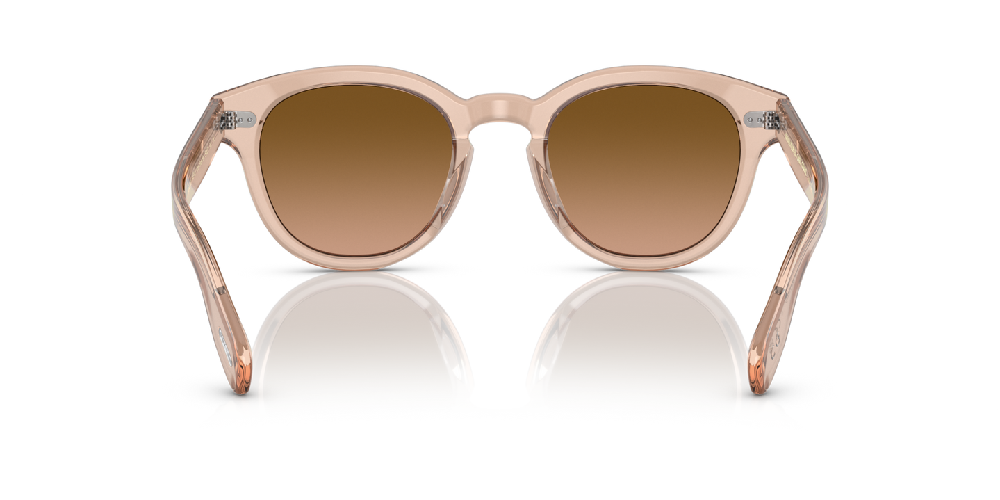 Sie Oliver Peoples Cary Grant Sun mit Blush Gestell und Rosa Gläsern - Bild Stegplättchen