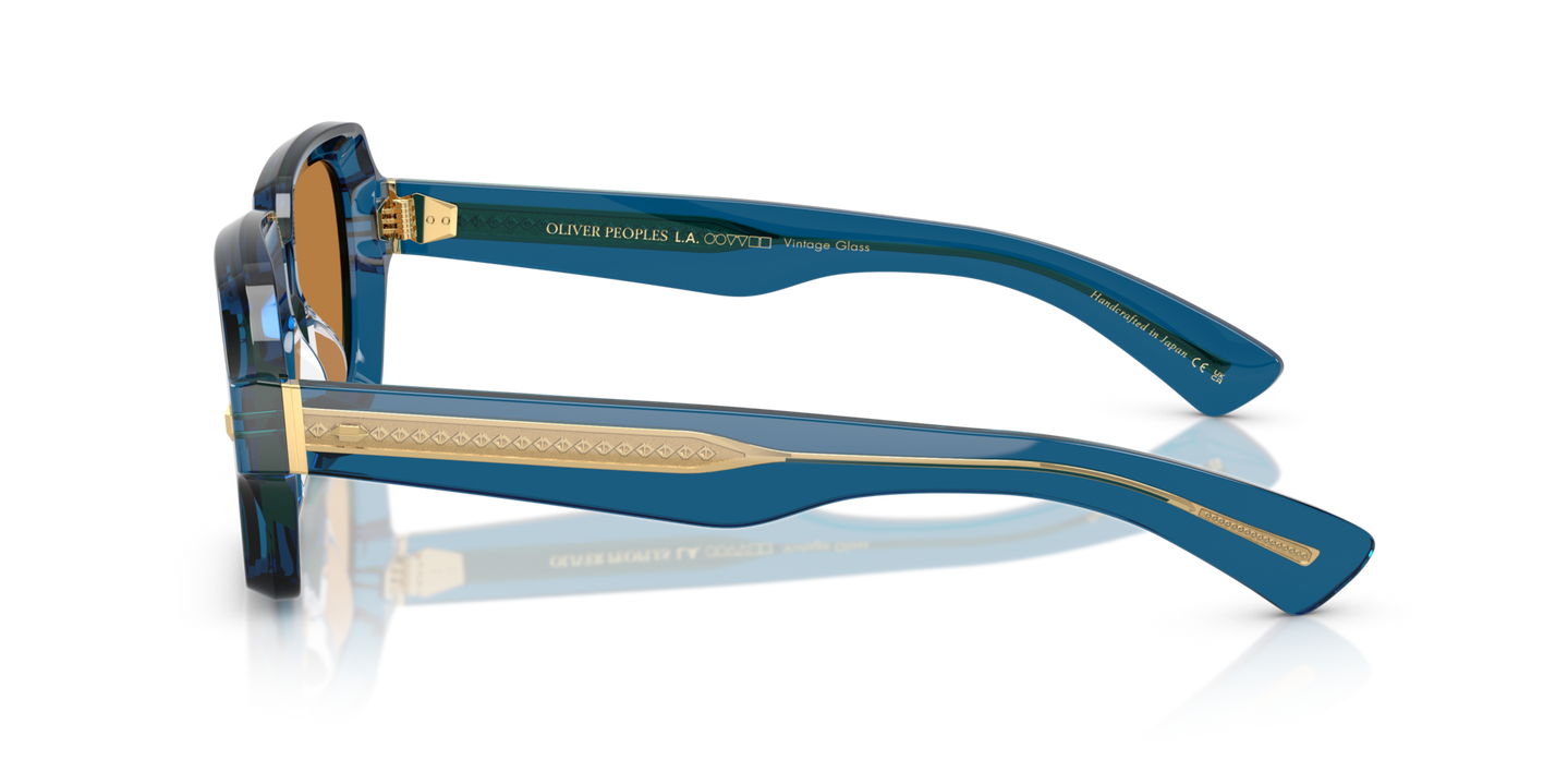 Sie Oliver Peoples Devaney 18k mit Blau durchsichtig Gestell und Braun Gläsern - Bild Filigranarbeiten